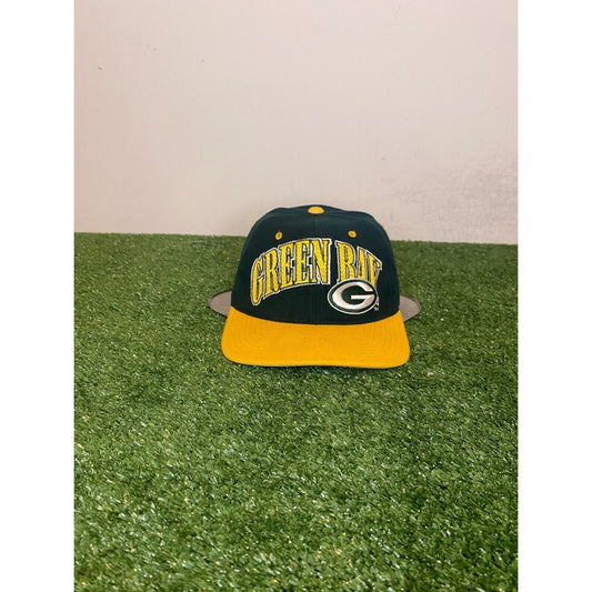 Vintage Starter Green Bay Packers arch block head snapback hat 1990s NFL